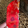 Chinese flowers red silk bag