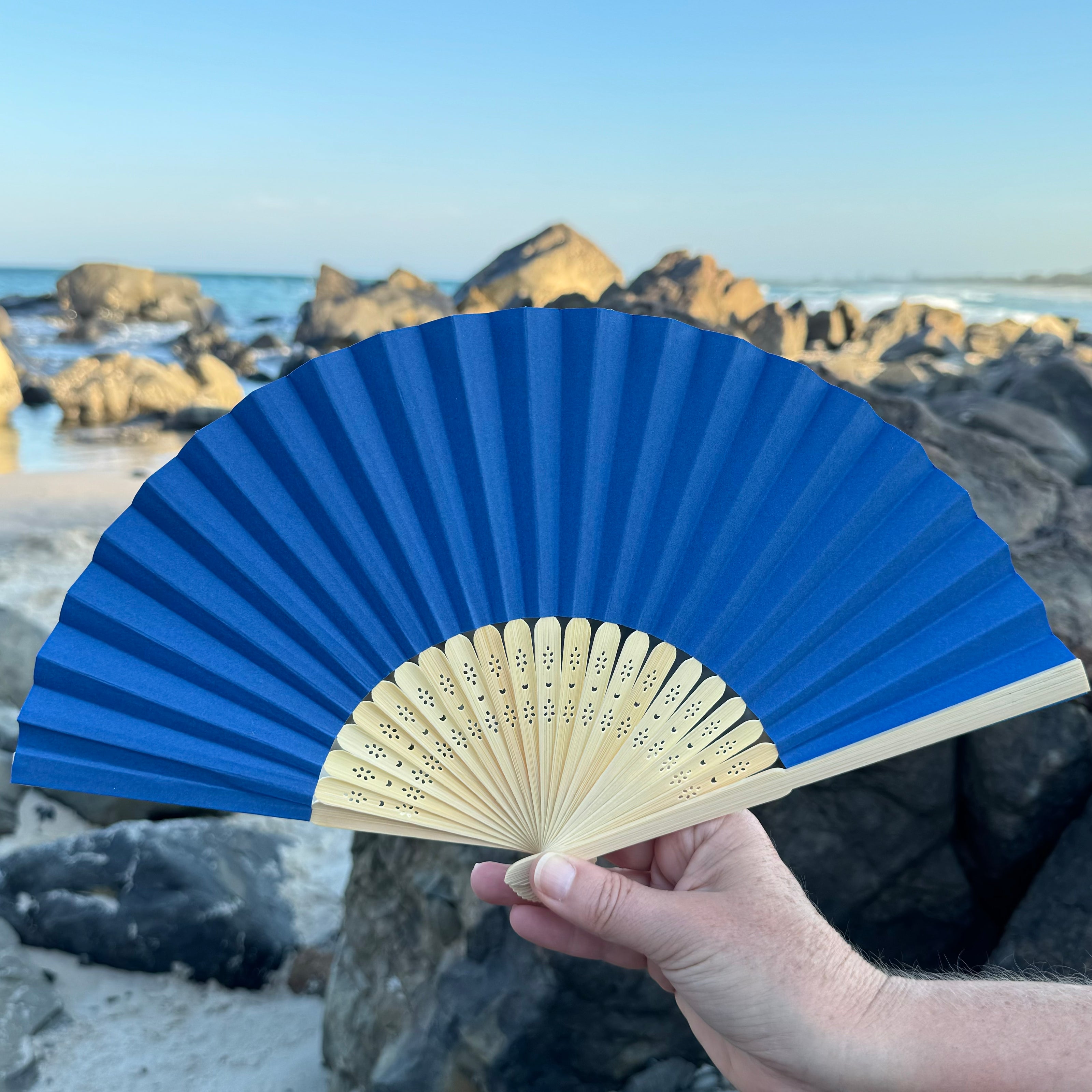 dark blue paper fan