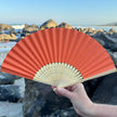 orange paper fan