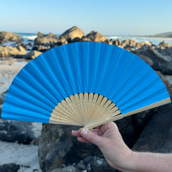 bright blue paper fan