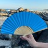 bright blue paper fan