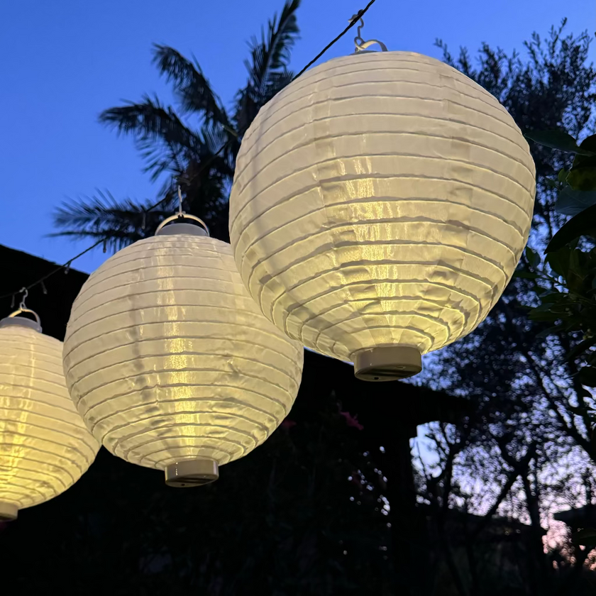 garden wedding lanterns illuminated