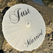 wedding parasol at beach wedding