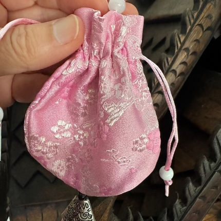 pink silk Chinese bag with flower embroidery