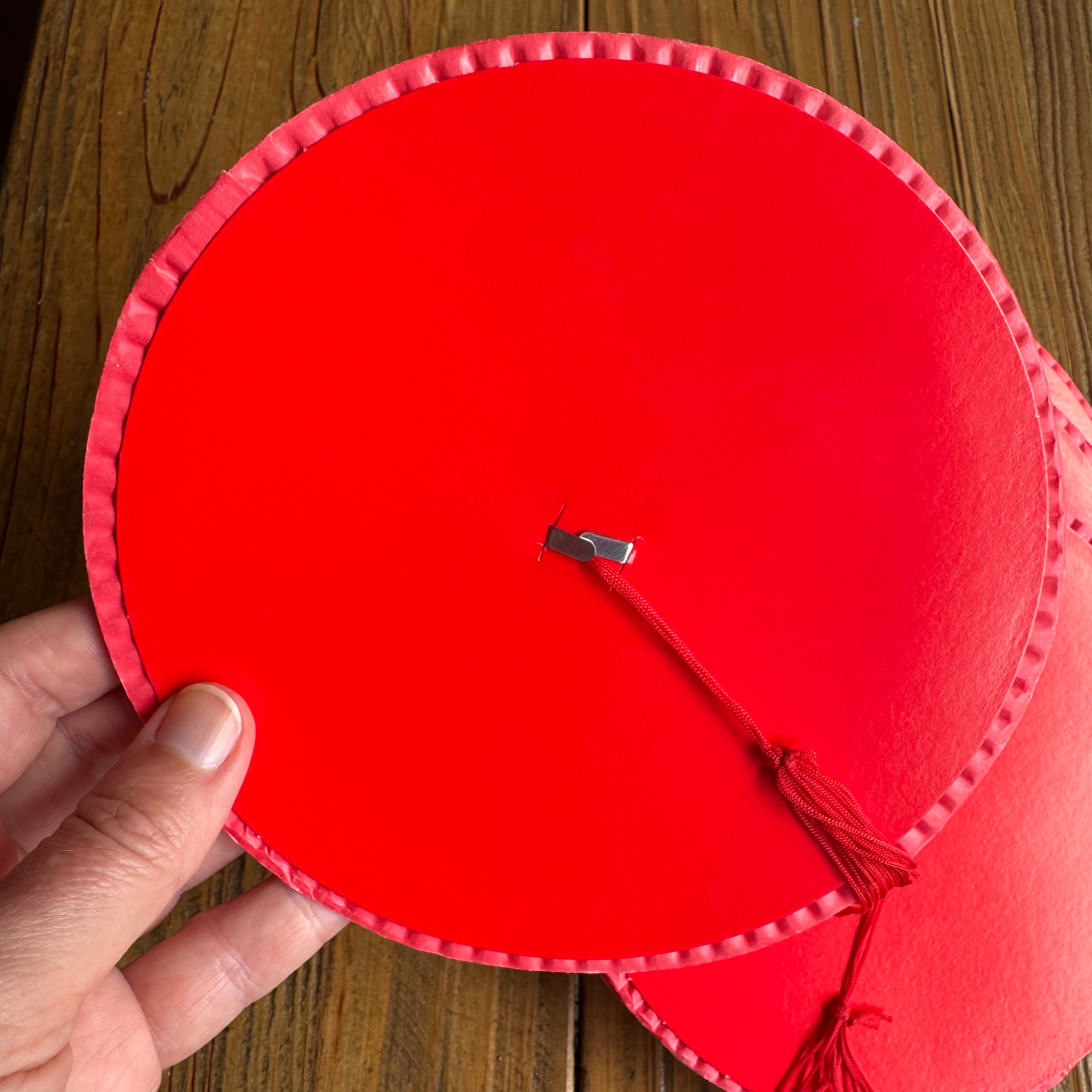 Traditional red Chinese paper lanterns with red tassel tail for Asian festival celebrations