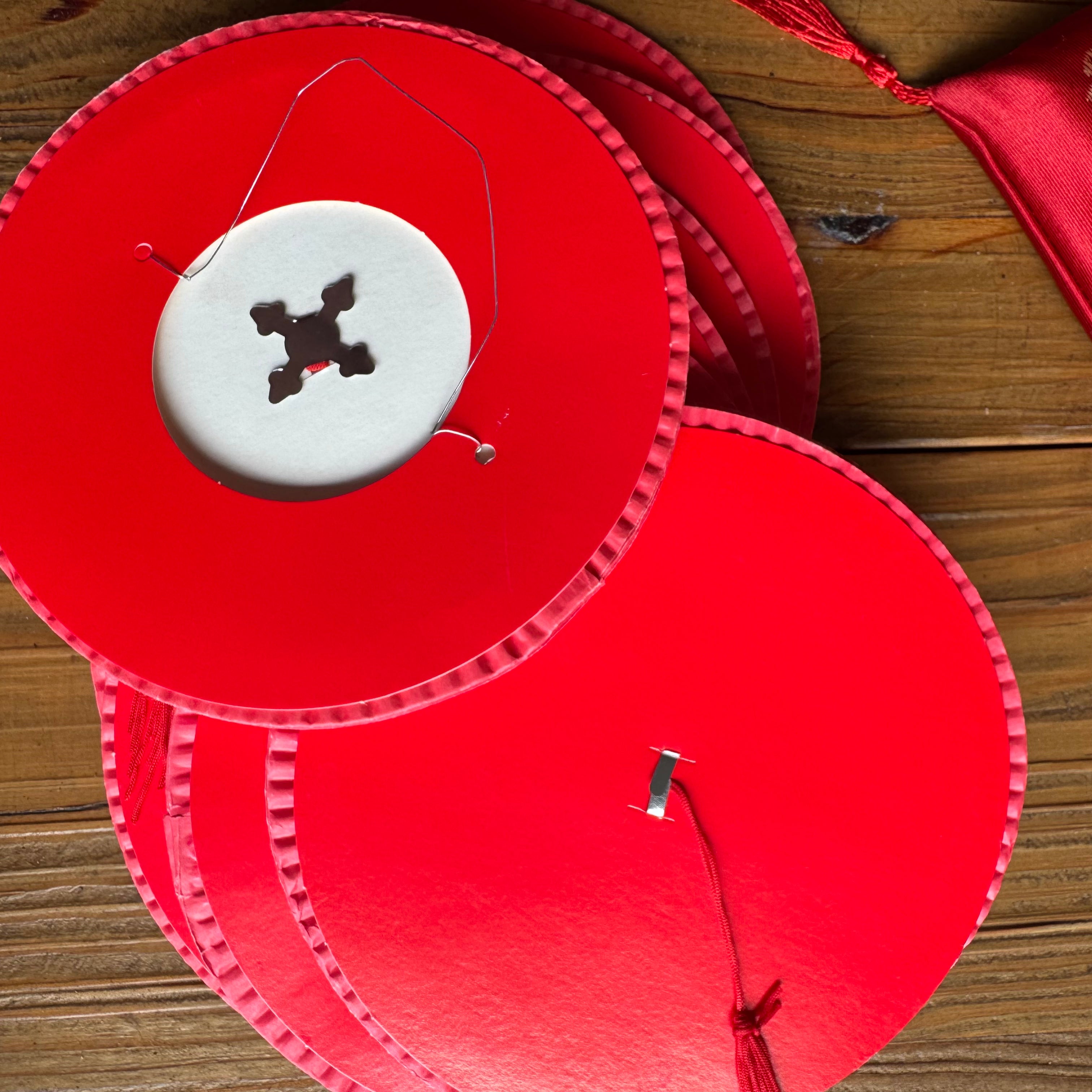 Traditional red Chinese paper lanterns for festival celebrations.  