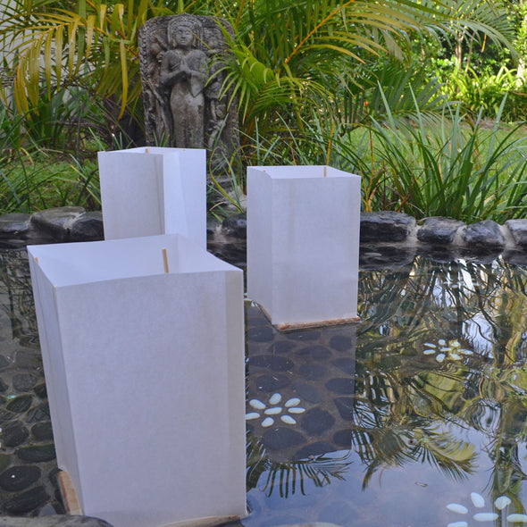 floating bamboo/white paper lanterns with candles