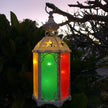 Illuminated Moroccan lantern at dusk