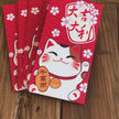 waving cat