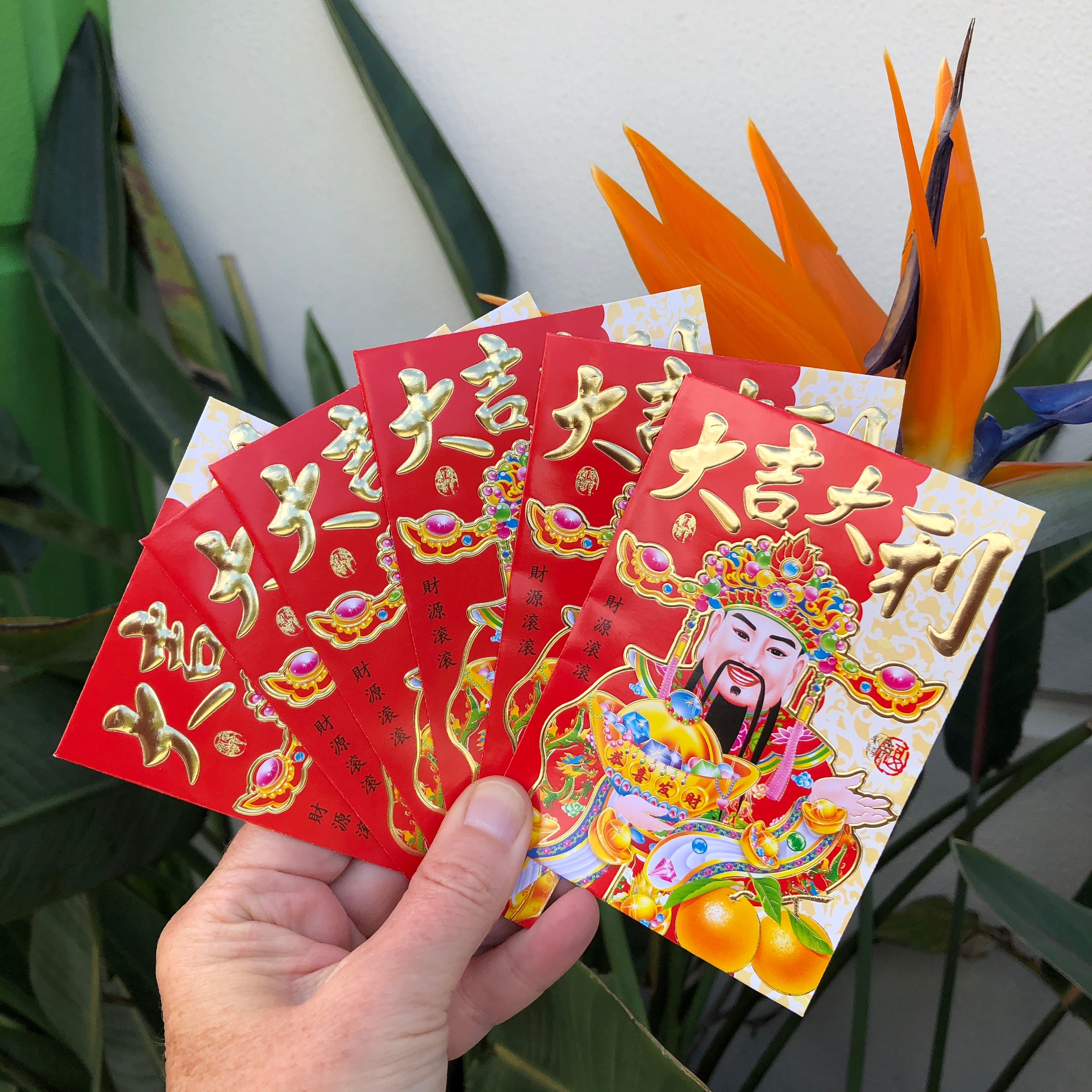 Money In Red Envelope Ang Pao Decorated With Photo Of God Of